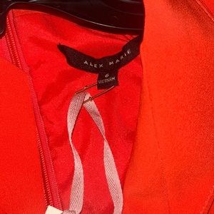 Coral, sleeveless jumper, size 6 (Vietnam). Never worn. Tags still on the item.